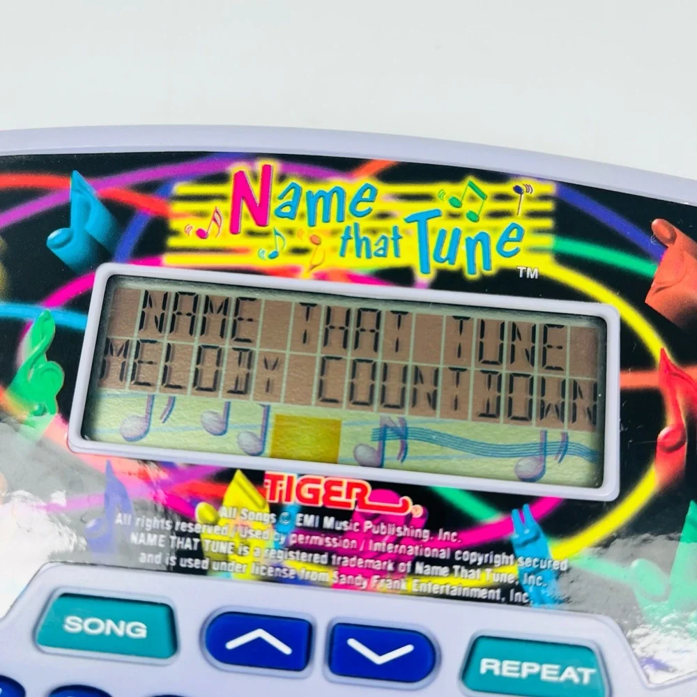 Tiger Name That Tune Electronic Handheld Game Pop Hits 60s-90s Tunes 1997 VTG